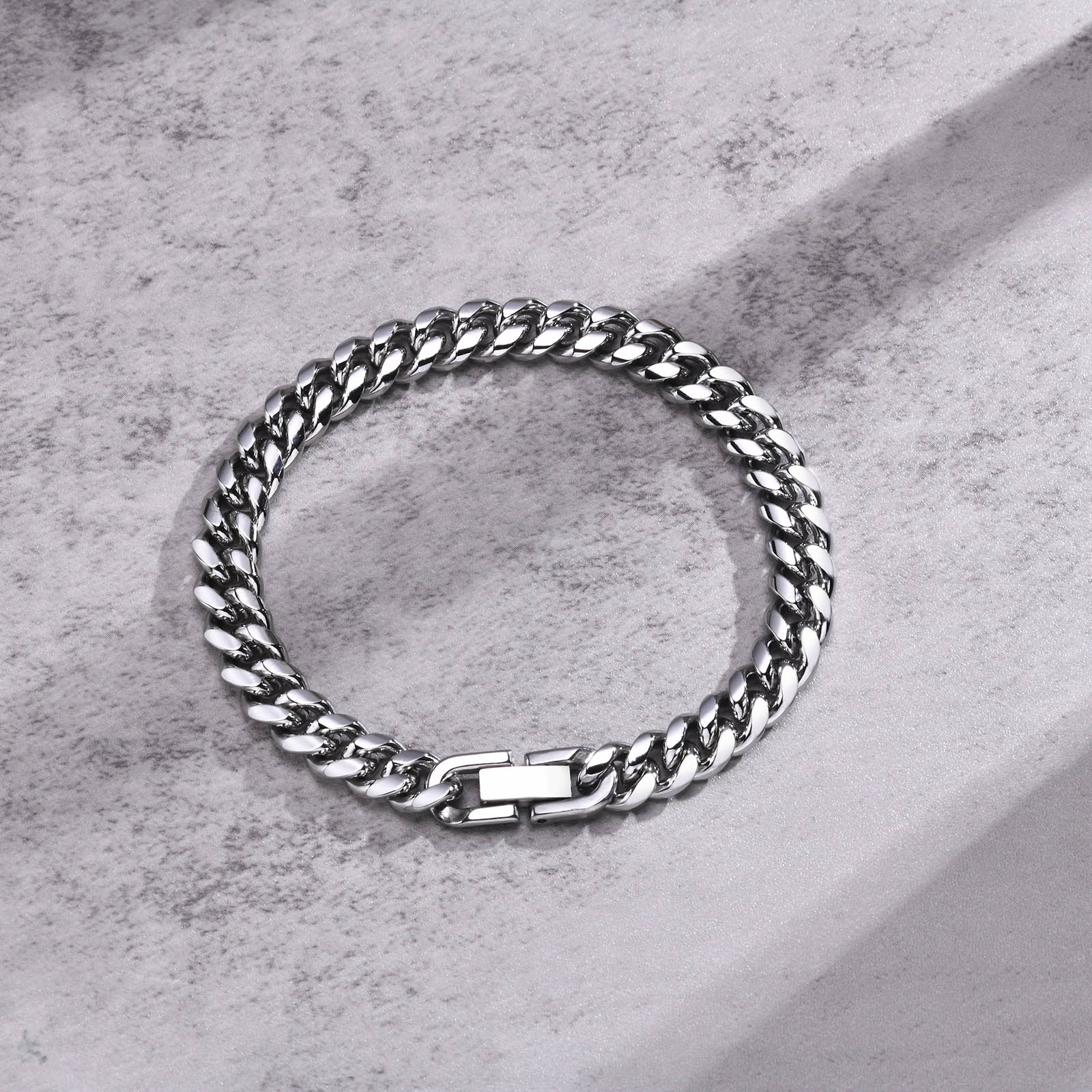 Pulseira corrente cubana em aço inoxidável sólido, largura 6 mm a 12 mm, fecho oculto, design sofisticado.