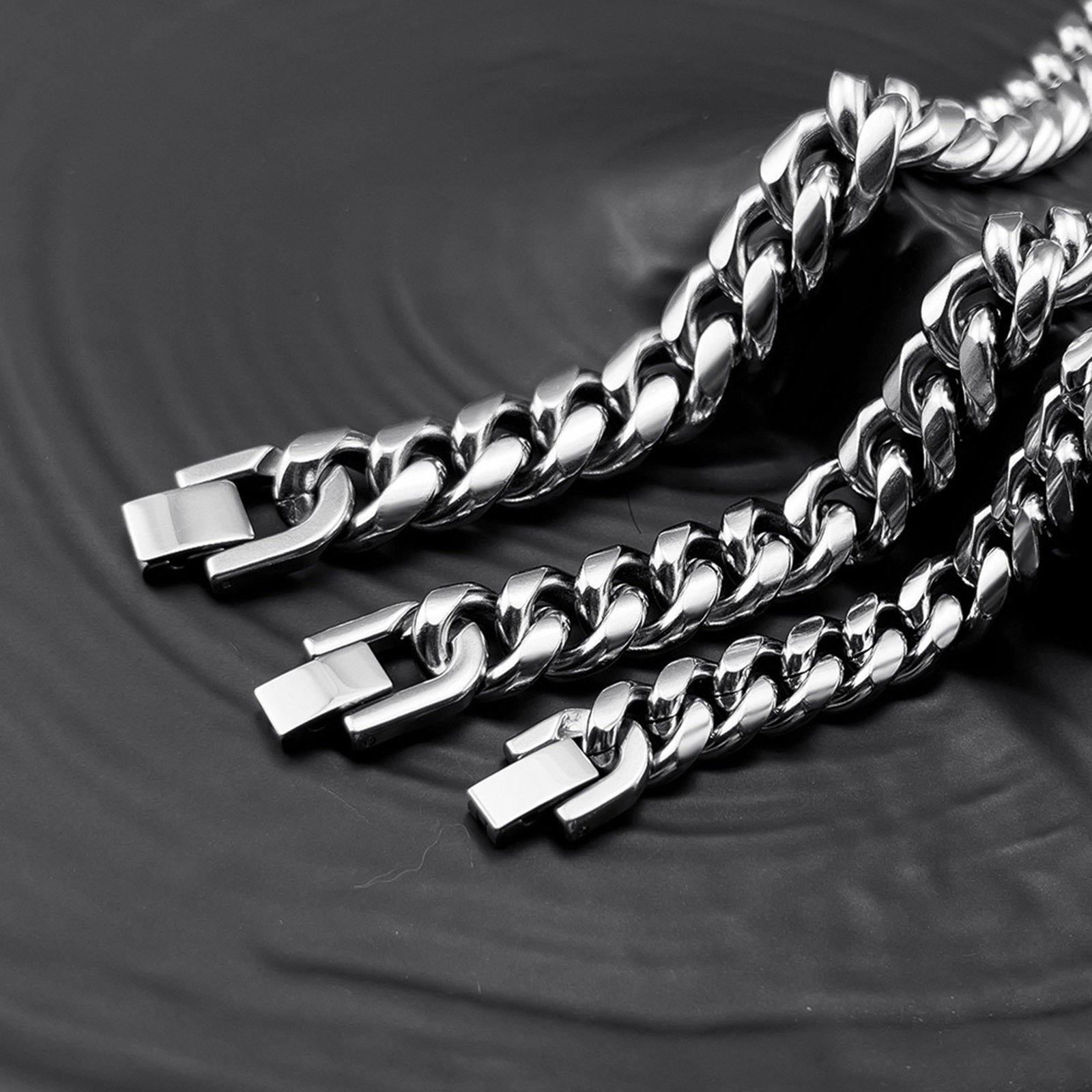 Pulseira corrente cubana em aço inoxidável sólido, largura 6 mm a 12 mm, fecho oculto, design sofisticado.