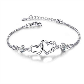 Pulseira de prata esterlina 925 com pingente de coração em cristal, delicada e sofisticada.