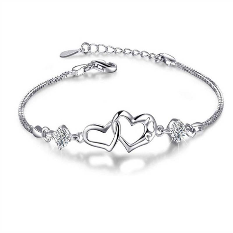 Pulseira de prata esterlina 925 com pingente de coração em cristal, delicada e sofisticada.