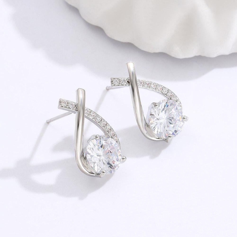 Brincos Cruzados Elegantes Verzano® – brincos femininos com anéis de cristal e design geométrico, feitos em liga de zinco, estilo coreano e trendy, para eventos e presentes sofisticados.