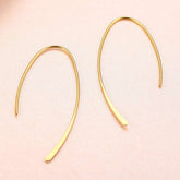 Brincos de argola geométricos minimalistas em aço inoxidável dourado ou prateado, design elegante e sofisticado para mulheres modernas.