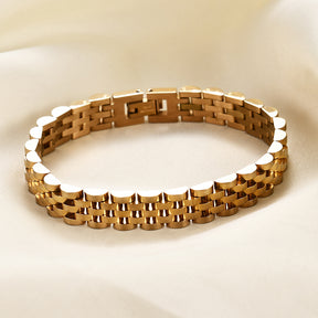 Pulseira minimalista em aço inoxidável chapeado a ouro ou preto, design elegante e versátil.