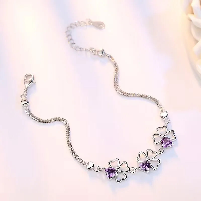 Pulseira Lucky Clover Verzano®, Prata Esterlina 925, trevo de quatro folhas com cristal roxo, joia elegante e sofisticada, ideal para festas e ocasiões especiais.