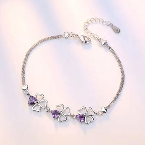 Pulseira Lucky Clover Verzano®, Prata Esterlina 925, trevo de quatro folhas com cristal roxo, joia elegante e sofisticada, ideal para festas e ocasiões especiais.