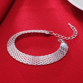 Pulseira Elegância Tecida da Verzano® em prata esterlina 925 com corrente de tecelagem refinada, ideal para mulheres em eventos elegantes.