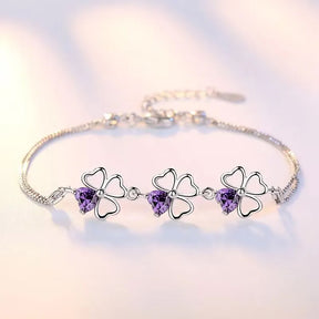 Pulseira Lucky Clover Verzano®, Prata Esterlina 925, trevo de quatro folhas com cristal roxo, joia elegante e sofisticada, ideal para festas e ocasiões especiais.
