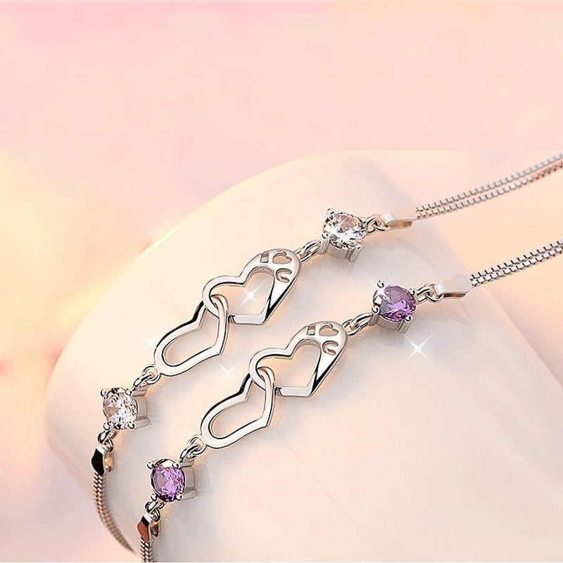 Pulseira de prata esterlina 925 com pingente de coração em cristal, delicada e sofisticada.