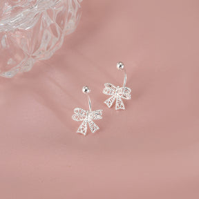 brincos minimalistas, brincos de laço, brincos românticos, prata esterlina, joias femininas, acessórios sofisticados, brinco de festa, presentes para namorada, joias elegantes, brinco Verzano