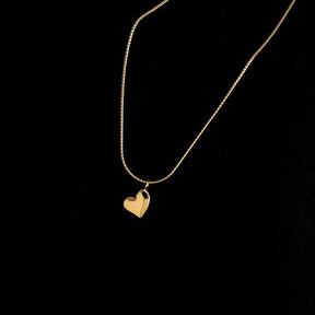 Colar de pingente de coração em aço inoxidável, joias modernas para mulheres, estilo sofisticado e elegante.