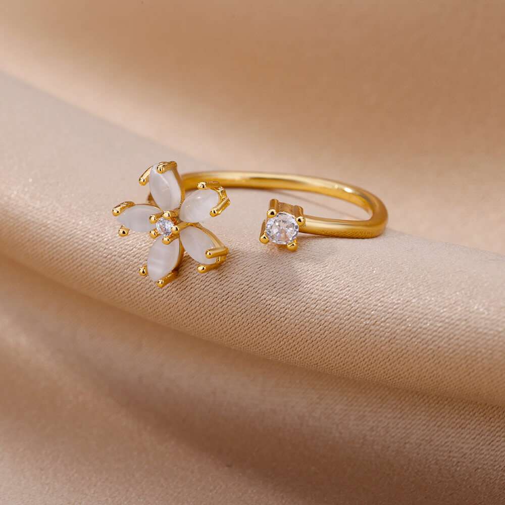Anel floral ajustável em aço inoxidável dourado com detalhes em zircônia – Verzano®.
