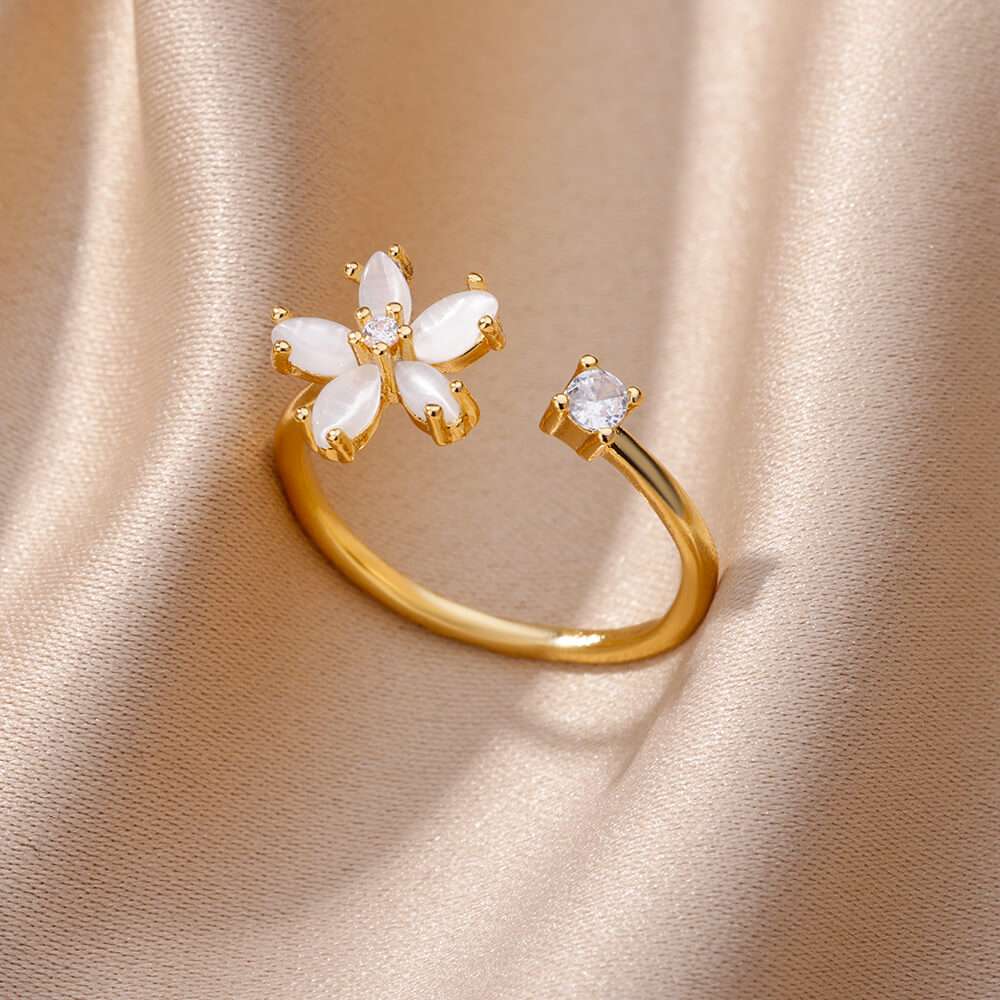 Anel floral ajustável em aço inoxidável dourado com detalhes em zircônia – Verzano®.