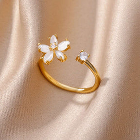 Anel floral ajustável em aço inoxidável dourado com detalhes em zircônia – Verzano®.