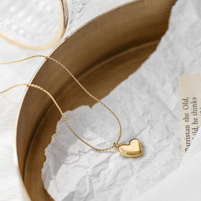 Colar de pingente de coração em aço inoxidável, joias modernas para mulheres, estilo sofisticado e elegante.