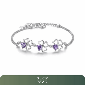 Pulseira Lucky Clover Verzano®, Prata Esterlina 925, trevo de quatro folhas com cristal roxo, joia elegante e sofisticada, ideal para festas e ocasiões especiais.