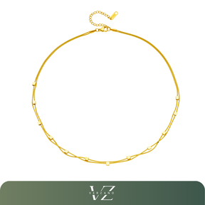 Colar Dualis Verzano – colar feminino de aço inoxidável 316L com correntes cubanas duplas, acessório moderno e sofisticado disponível em dourado e prateado.