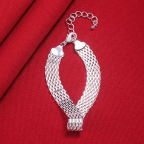 Pulseira Elegância Tecida da Verzano® em prata esterlina 925 com corrente de tecelagem refinada, ideal para mulheres em eventos elegantes.